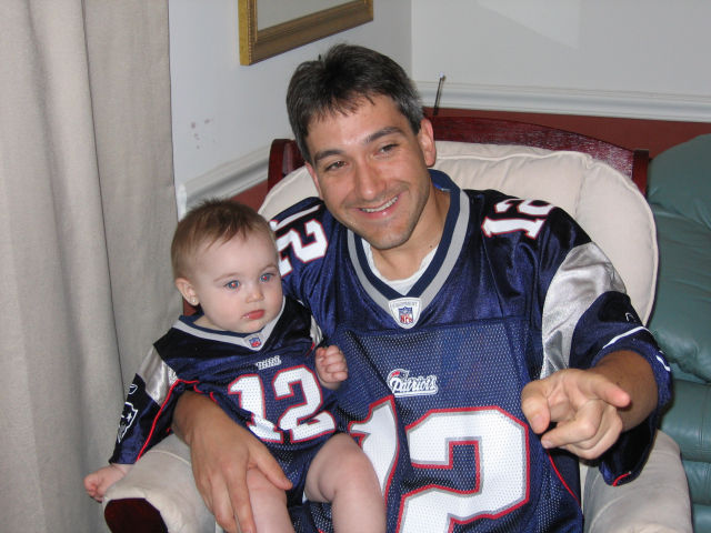 Ashley & Daddy watching the Patriots kick some butt